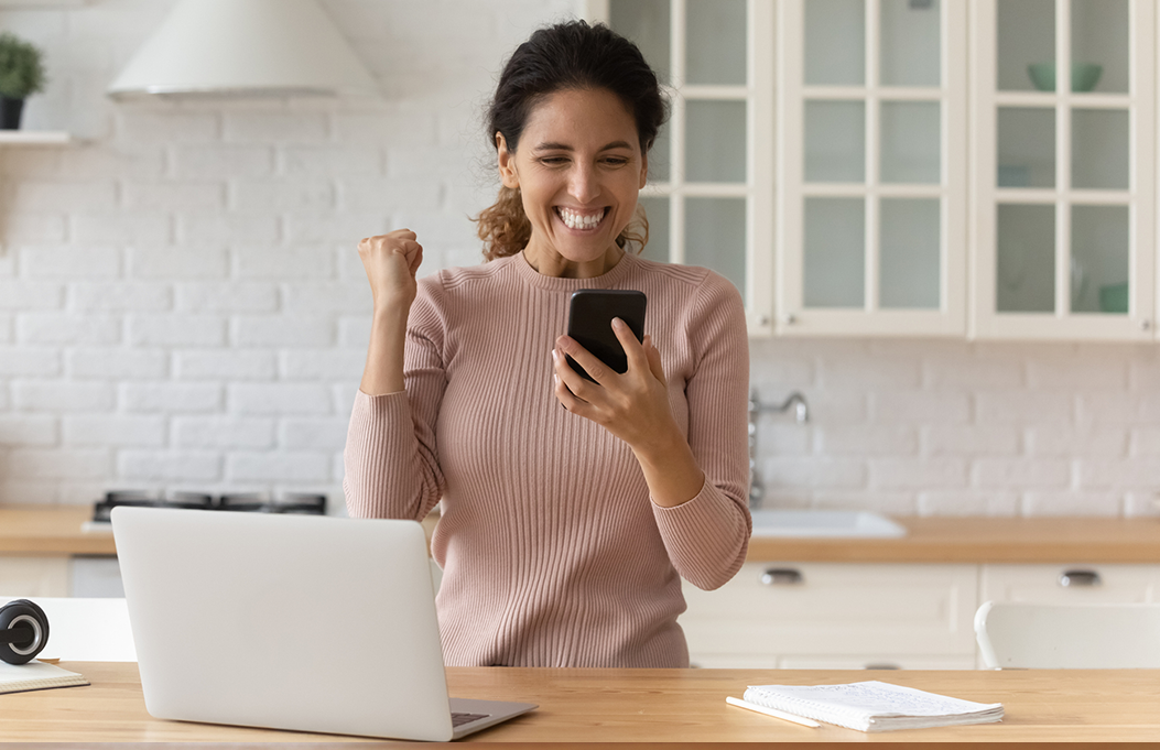 Social Media Contests That Work - Woman excited about results